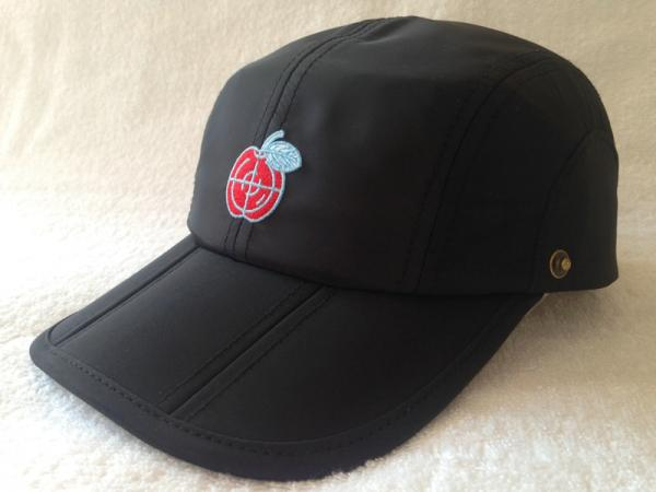 Cap with button